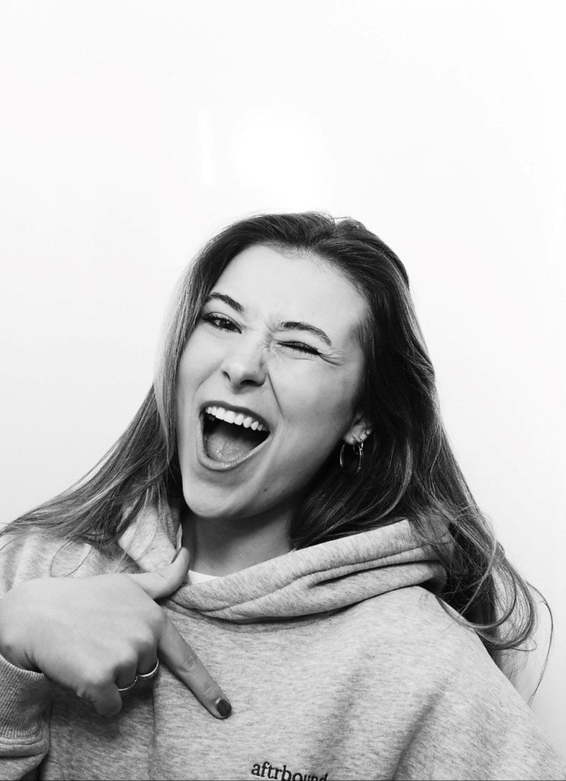 Black and white photo collage of a woman with text and logo on a black background